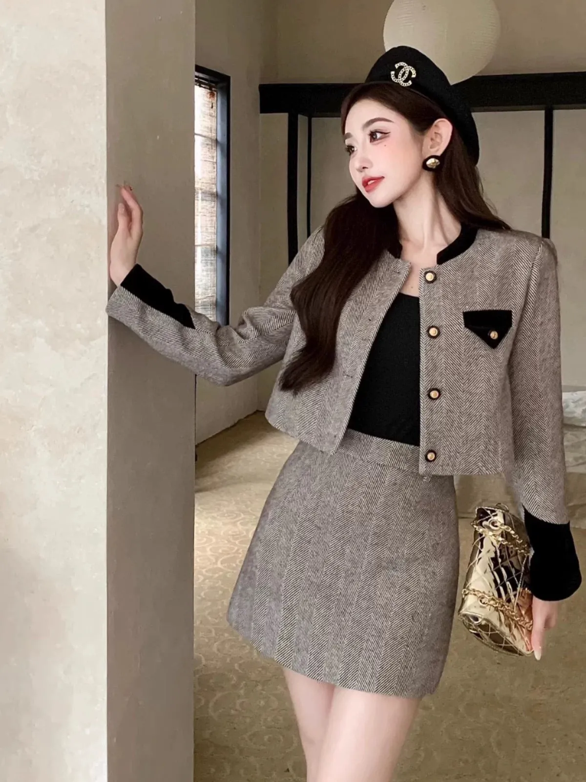 Shenzhen Nanyou European goods rich daughter Xiaoxiangfeng light luxury two-piece set herringbone woolen coat short skirt suit a